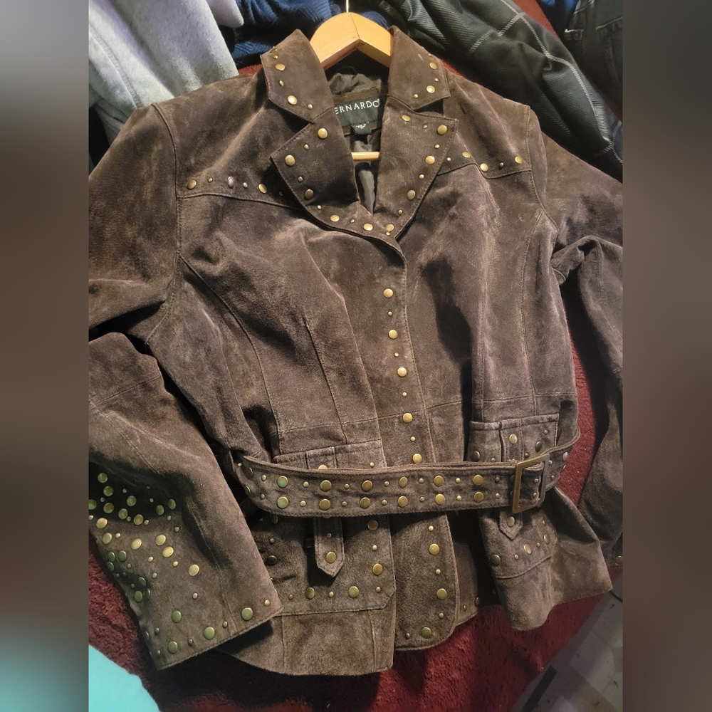 Woman's suede coat with small brass accents